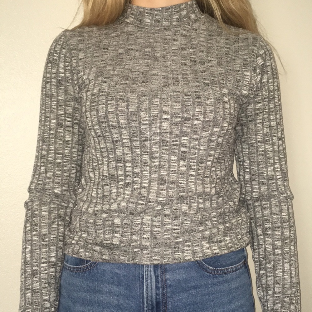Gray an white ribbed mock neck.